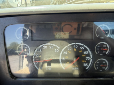 Dashboard view of a 2006 Sterling LT9500 with multiple gauges including speedometer, tachometer, and digital readout showing mileage.