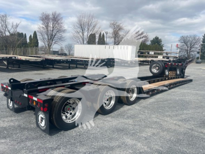 Lowboy trailer showing tandem rear axles and long flatbed with gooseneck; Fontaine 55H-Dsr model, VIN 13NE53301V35A7006, stock V35A7006.