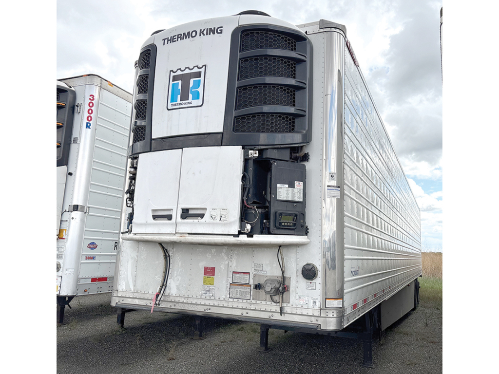 Reefer trailer with Thermo King unit on front, Everest series by Great Dane, silver exterior, rear visible wheels, VIN TW802595 and stock 547703.