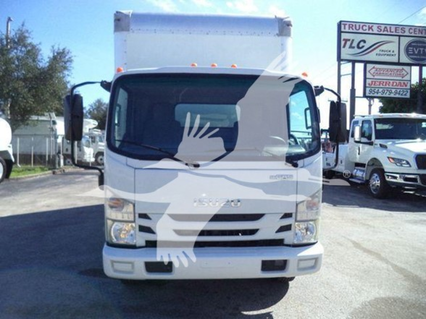 Isuzu NPR HD box truck front view showing cab and cargo box with Isuzu emblem on grille.
