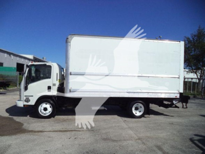 Isuzu NPR HD medium-duty box truck side view showing cab and box cargo area; no legible labels visible on the truck from distance.