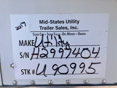 Sticker on mid-size utility trailer showing "Mid-States Utility Trailer Sales, Inc." with serial number H2997404, stock number  U90995, STK#  U90995, S/N H2997404, and handwritten year 2017.