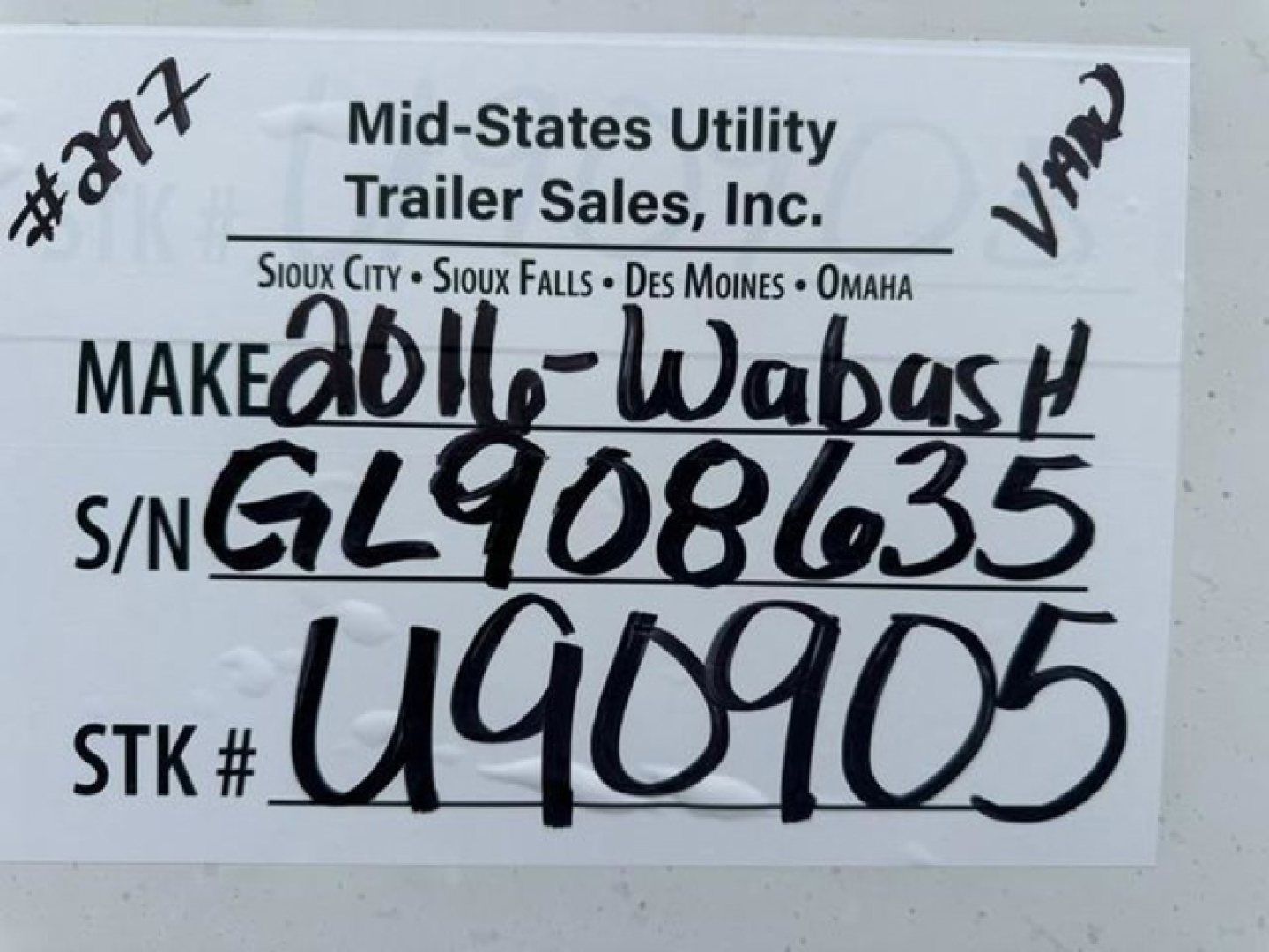 Trailer info tag showing handwritten VIN and stock number for a 2016 Wabash van. Text includes: 'Mid-States Utility Trailer Sales, Inc.' and 'S/N GL908635' 'STK # U90905' handwritten numbers.