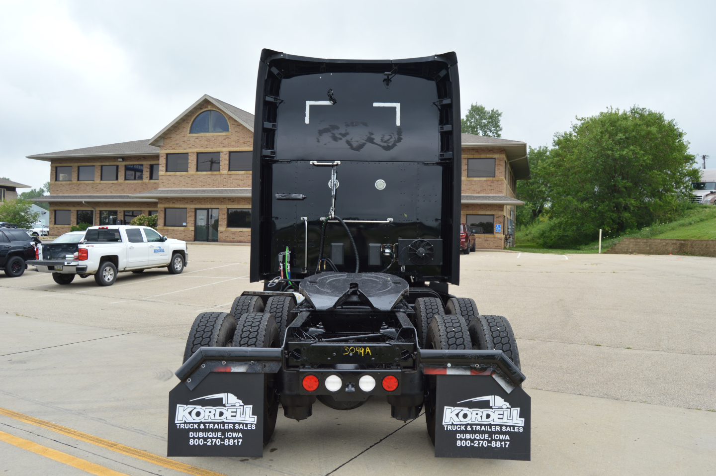 Kenworth T680 rear view showing fifth wheel area and mud flaps with Kordell Truck & Trailer sales contact numbers