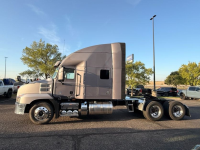 2023 Mack AN64T70 tractor-trailer side view showing cab and two rear axles (trailer not attached).