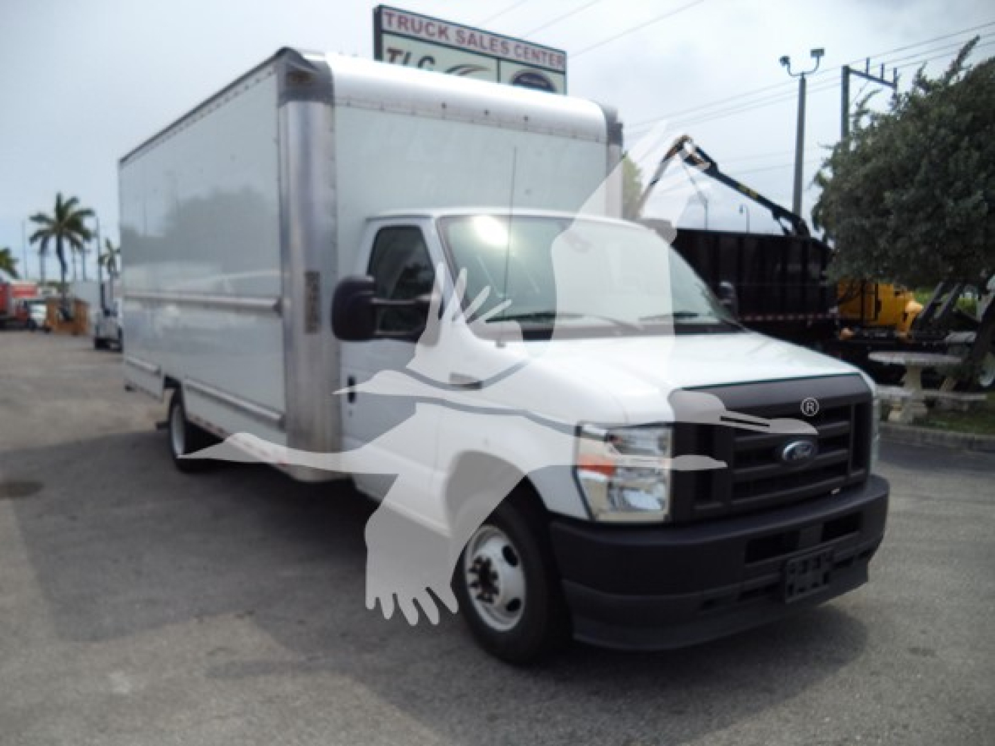 Ford E-350 box truck in service view showing side and front with large cargo box and cab; VIN 1FDWE3FN6NDC03440 not visible on image