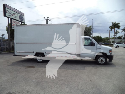 Used 2022 Ford E350 box truck with high cube body and white exterior, side view showing cargo box and cab.