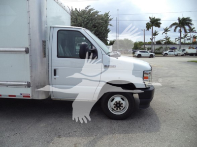 Ford E-350 box truck side view showing cab and cargo box, with no identifying decals visible.