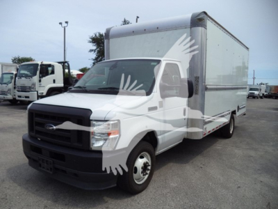 Ford E-350 cargo box truck side view showing cab and box with white exterior and black front grille.