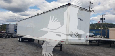 Trailmobile dry van trailer side view showing white graphic birds and markings 53552 000447