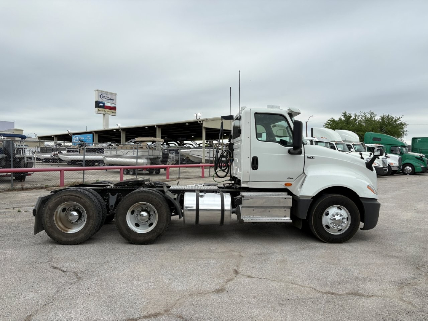 2019 International LT conventional daycab truck side profile showing cab, chassis, and dual rear axles. Visible text on listing: VIN 3HCDZTZR0KL369766, Stock B3113P, Category Conventional Daycab, Type Trucks, NewUsed Used.