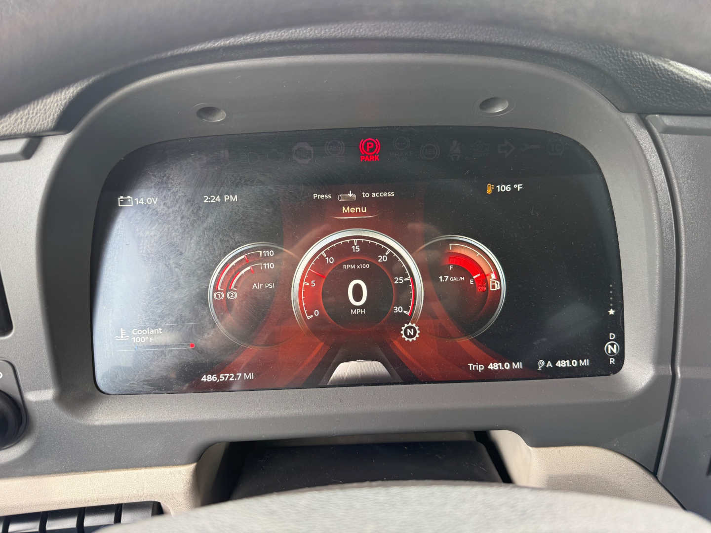 Peterbilt 579 digital gauge cluster showing 0 mph and various indicators in the center display