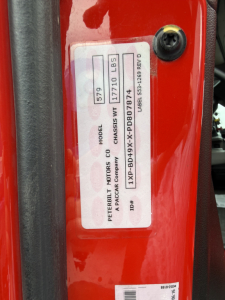 Peterbilt 579 truck door sticker showing model 579 and chassis weight information.