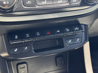 Chevrolet Colorado interior dash controls showing row of toggle buttons and climate controls