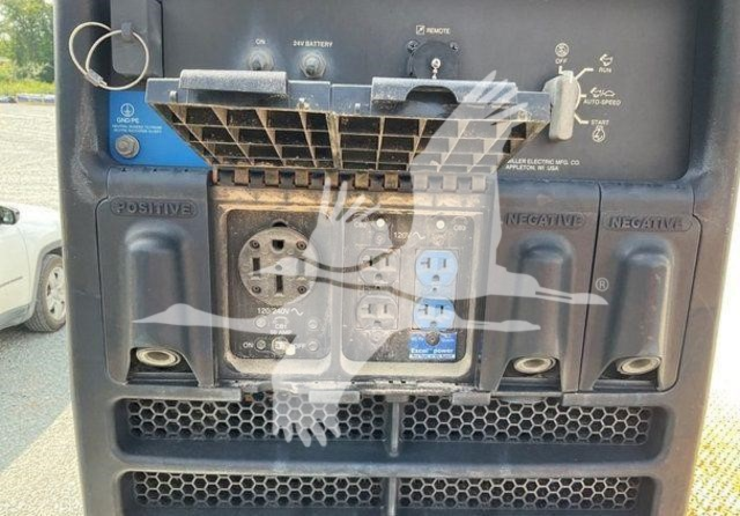 Service/utility truck rear showing dual rear sockets, panels, and wiring labeled positive and negative; includes two 120V receptacles and a blue 30A outlet with circuit labels and on/off switch.