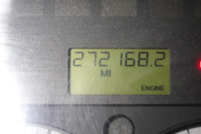 Dashboard odometer showing 272168.2 miles and engine indicator on display.
