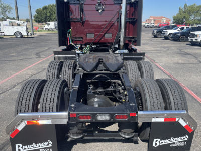 Volvo VNL64T860 tractor rear view showing fifth-wheel hitch, dual rear axles, and bumper with Bruckner’s Truck & Equipment logo.