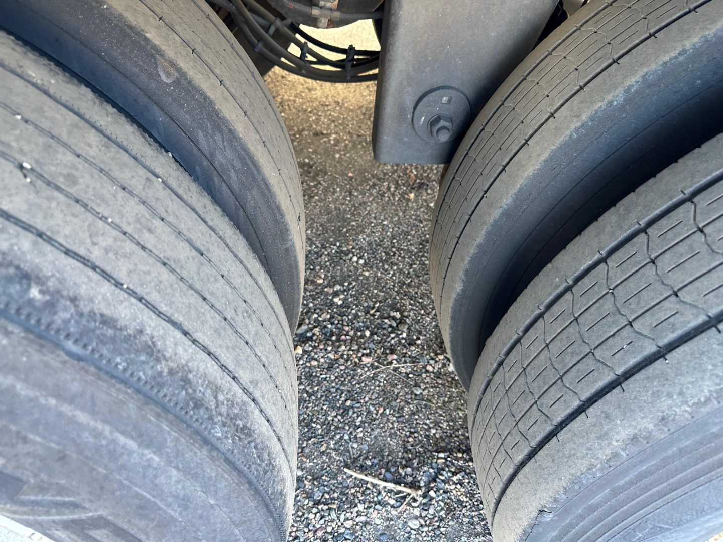 Rearview of Hyundai air ride dry van trailer showing dual rear tires and undercarriage components.