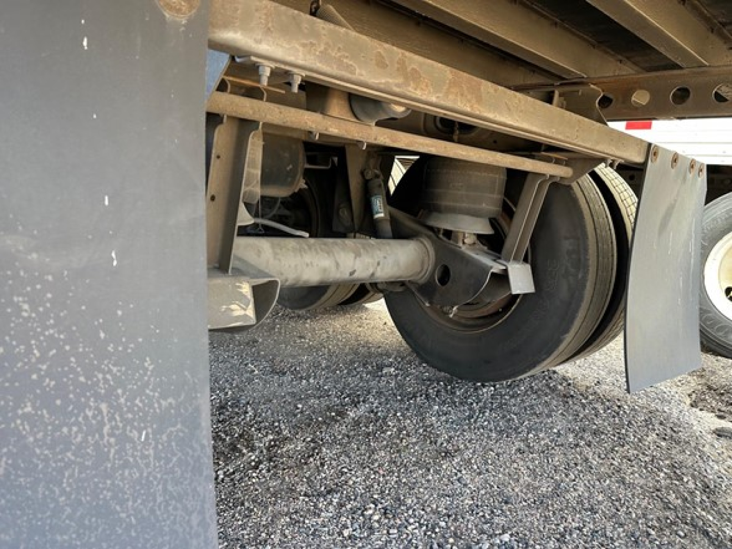 Hyundai air ride dry van trailer undercarriage showing wheel, suspension, and wearband components.