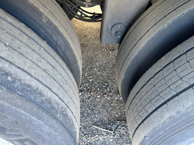 Rearview of Hyundai air ride dry van trailer showing dual rear tires and undercarriage components.