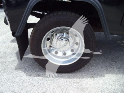 Ram 4500 wheel and tire under fender showing alloy rim and tire tread.