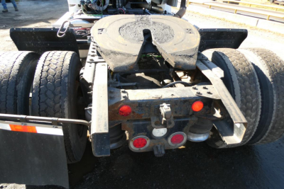 Freightliner M2 112 rear tractor chassis showing fifth wheel plate and dual rear wheels.
