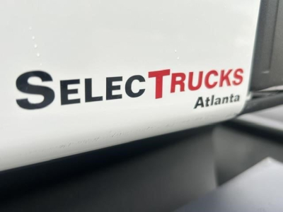 Truck cab side with SelecTrucks Atlanta logo visible