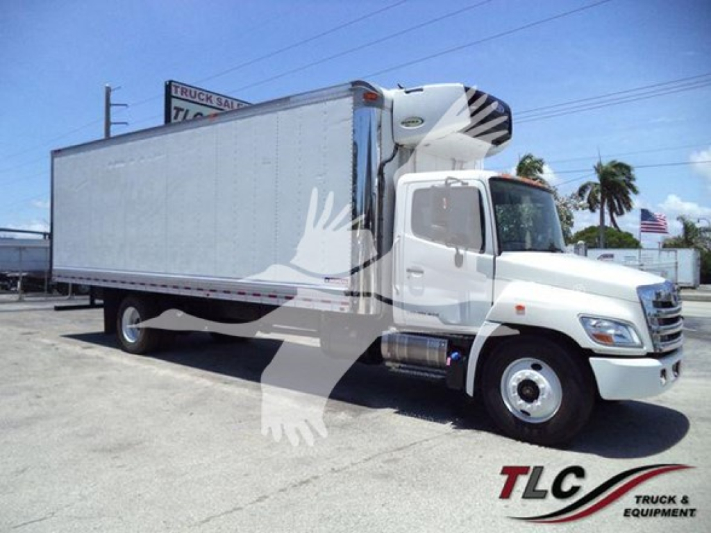 Hino 268A refrigerated truck side view showing cargo box and refrigeration unit