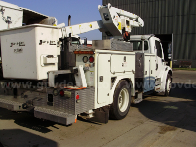 Freightliner M2 106 bucket truck rear/side view showing Dur-A-Lift bucket and utility compartments.