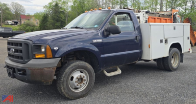 Ford F-350 XL Super Duty service body truck with Liftmore crane and utility compartments