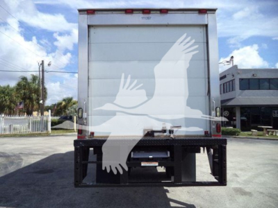 Rear view of 2015 Hino 268A refrigerated truck showing liftgate and back doors.