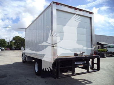 Used 2015 Hino 268A refrigerated truck rear/side view showing lift gate and box with blank light-gray doors.
