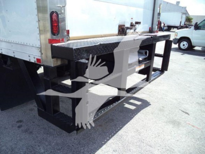 Rear view of a used 2015 Hino 268A refrigerated truck showing black rear bumper guard and platform with diamond plate edges.