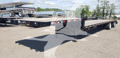 Trailers: 2027 Dorsey beavertail dropdeck trailer in a lot, flatbed with extended beavertail section and landing gear visible.