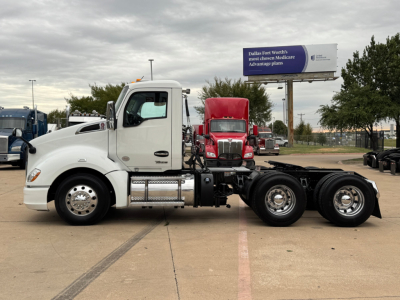Kenworth T680 tractor chassis side view with cab and rear axles; visible text on the truck's side reads 'Kenworth' on grille area and there are no legible model badges in the image.