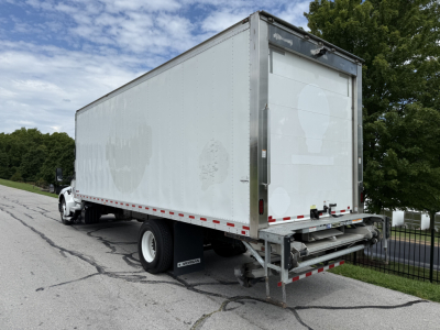 Kenworth T380 refrigerated box truck rear and side view showing back roll-up doors and reflective tape