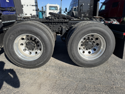 Mack PR64T76H truck dual rear wheels showing tires and chassis.