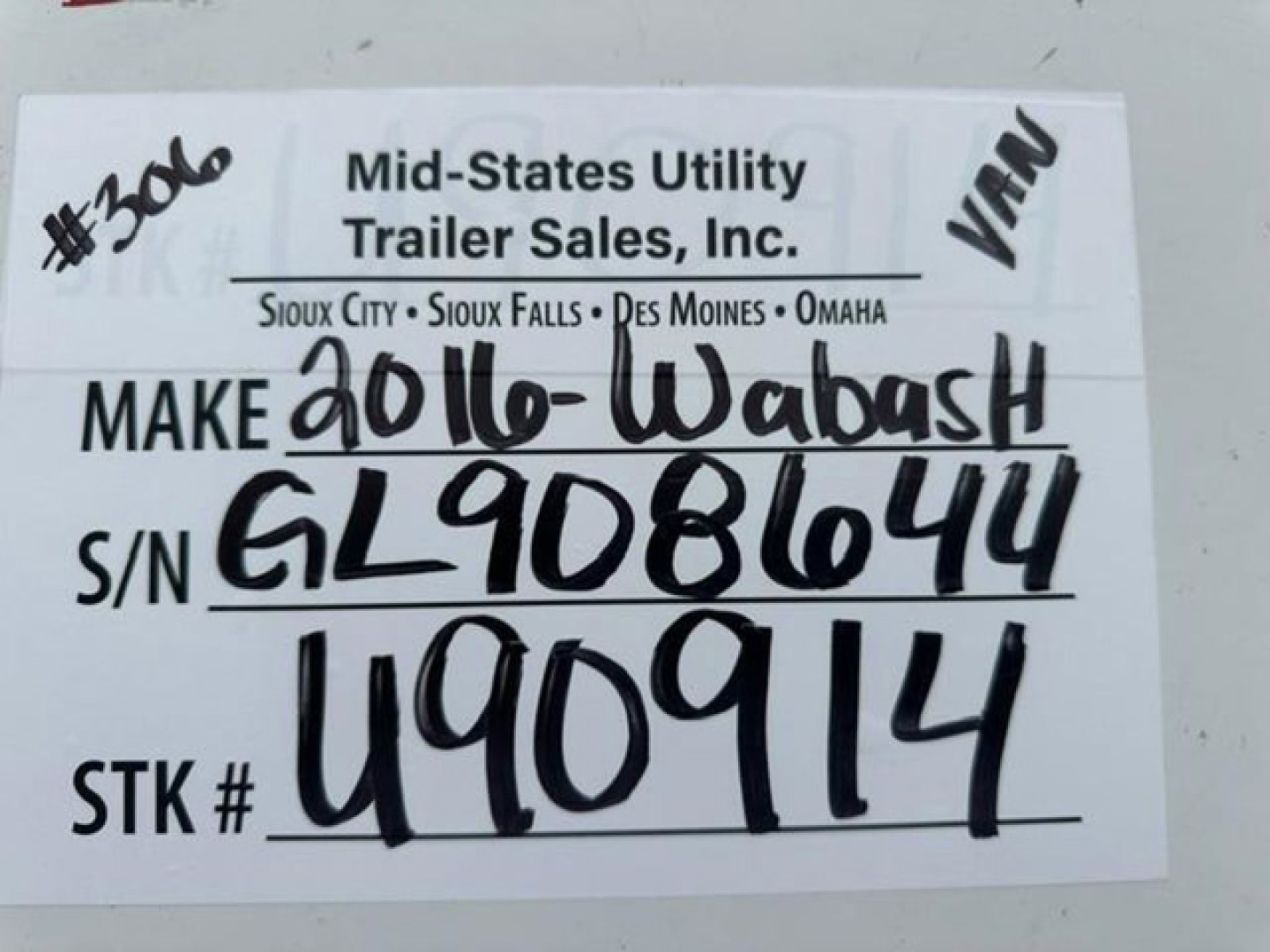 Trailer tag showing Make: 2016 Wabash handwritten on label with S/N GL9086044 and stock number U90914