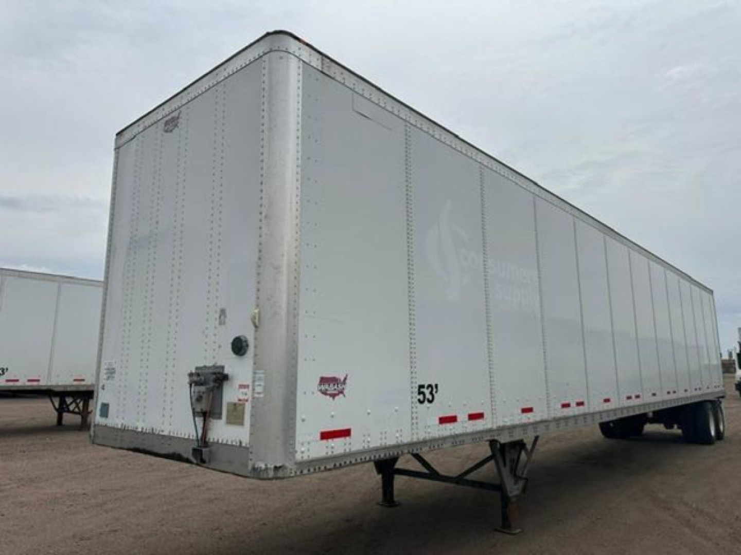 Trailer side view showing a white 53' Wabash van trailer with stock number U90914 and VIN 1JJV532D1GL908644.
