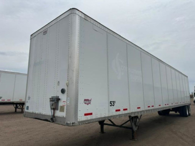 Trailer side view showing a white 53' Wabash van trailer with stock number U90914 and VIN 1JJV532D1GL908644.