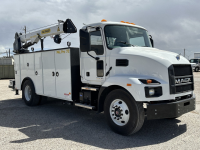 Mack MD7 service truck with crane arm on side, white cab and utility body, VIN 1M2MDBAA4SS076106 visible, stock 65650, new unit.