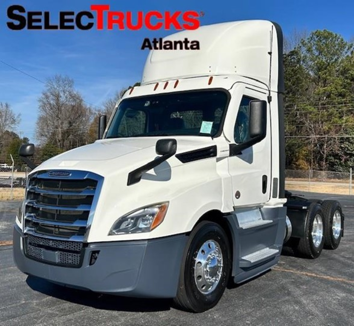 Freightliner Cascadia 126 tractor in white, side view showing cab and front grille, SelectTrucks Atlanta watermark.