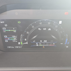 Mack PR64T76H dash display showing speedometer, RPM, and eco mode with 84°F outside temperature and various gauges.