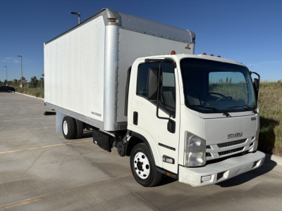 Isuzu NPR box truck side/front view showing cargo box and cab details.