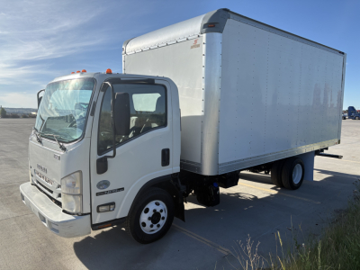 Isuzu NPR box truck front-left view showing cab and large box cargo area with white exterior