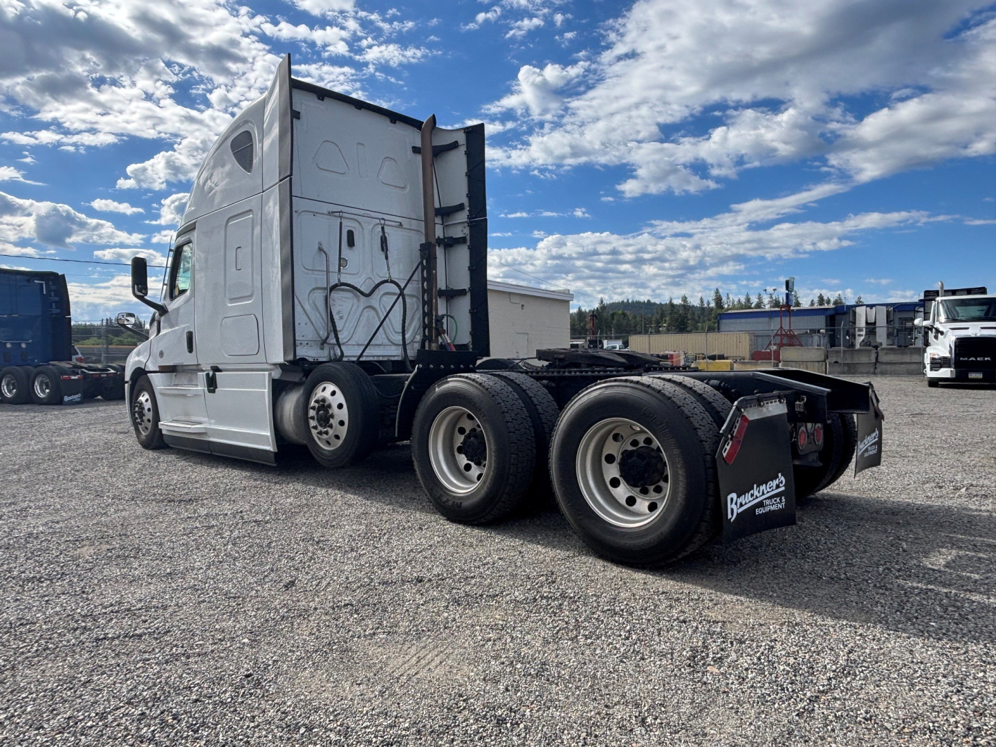 2021 Freightliner CA-126 conventional sleeper truck side view showing tractor rear wheels and fifth wheel without trailer.