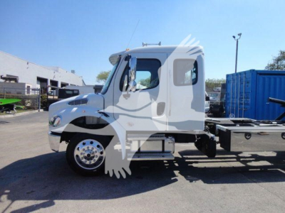 2027 Freightliner M2 106 rollback truck chassis cab with blue cab and white rollback bed; visible wheel, mirrors, side steps, and window. Stock tag not legible.