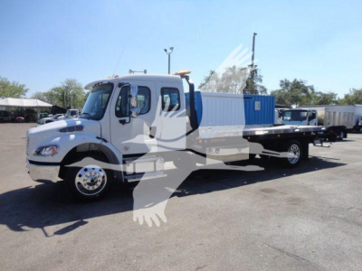 Freightliner M2 106 rollback truck showing cab and long bed with blue equipment container.
