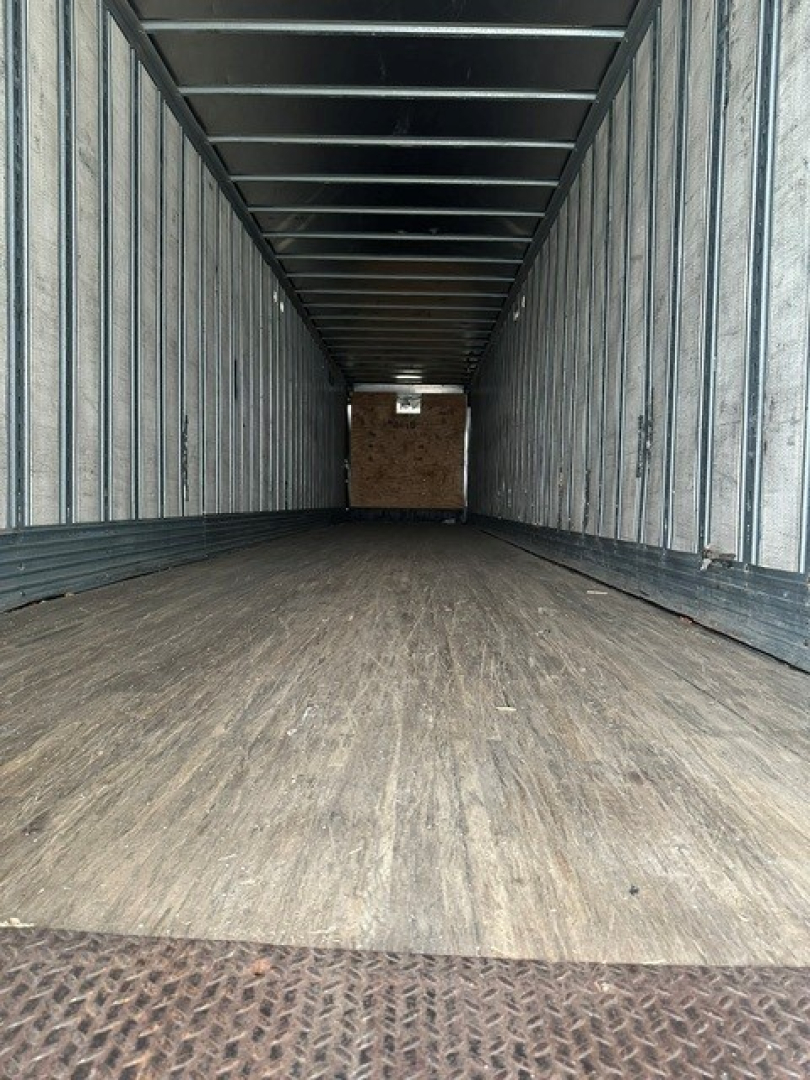 Interior of a 2009 Great Dane dry van trailer showing long empty cargo space with wood floor and metal sidewalls.