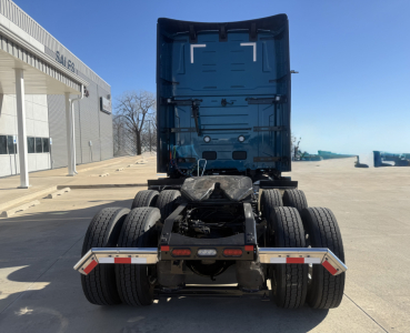 Mack PR64T76H truck rear view showing fifth wheel, bumper, and dual rear axles with tires. VIN and stock not visible on image.